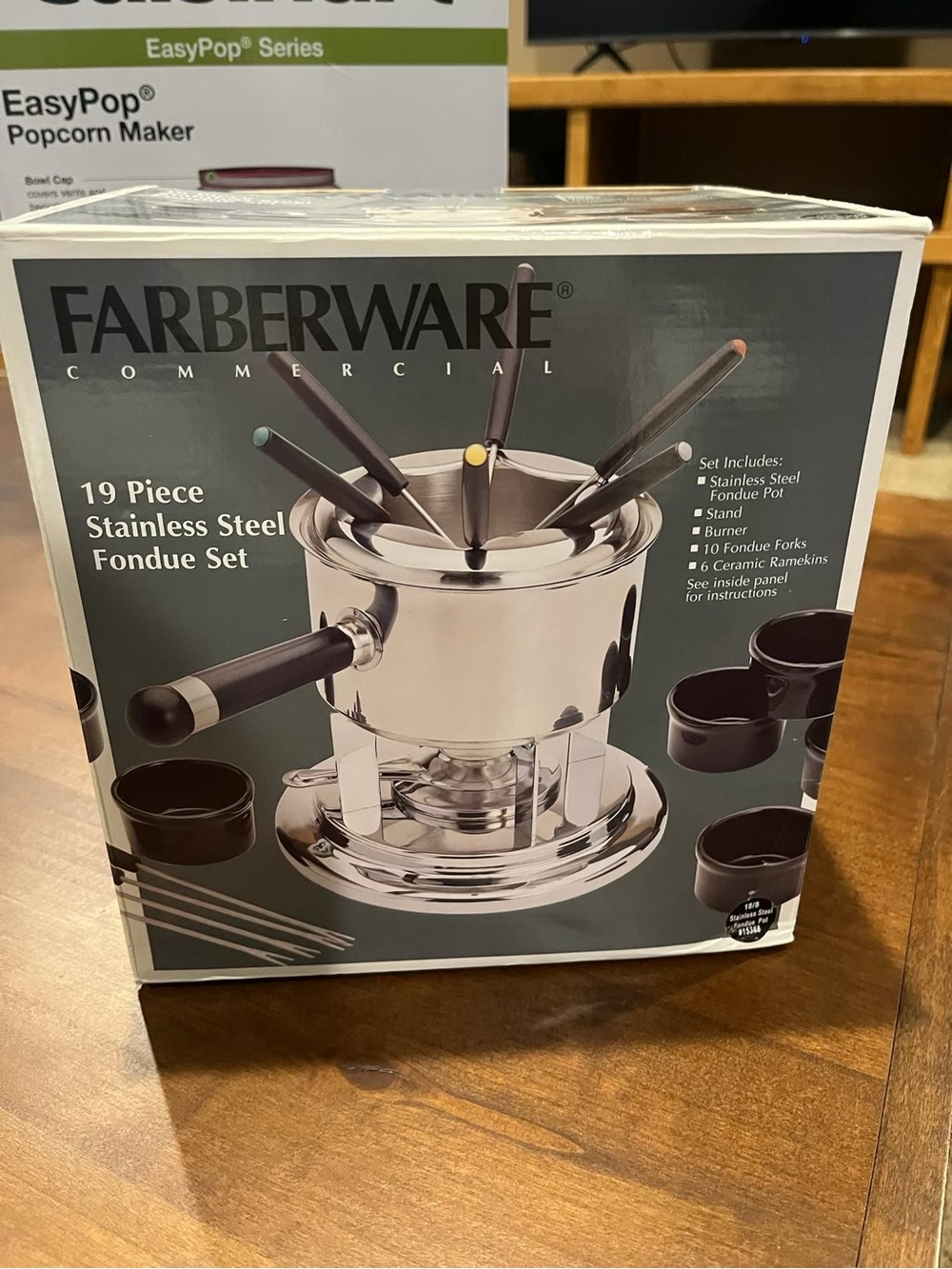 Farberware Stainless Steel Fondue Set with Black Handles and Brown Ramekins
